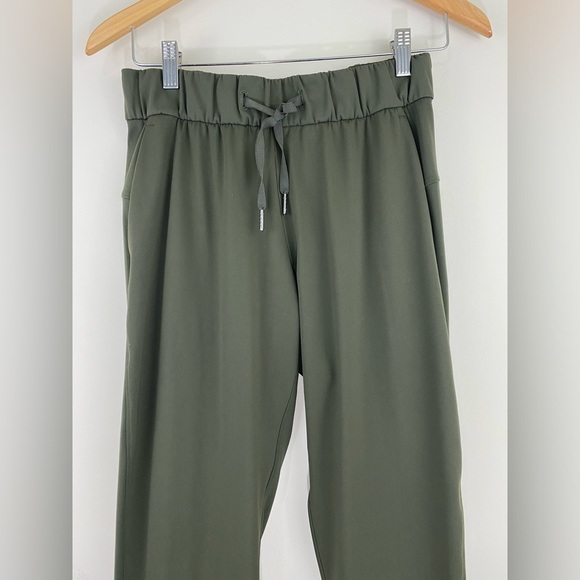 Lululemon Women’s Size 4 On the Fly 7/8 Pant Woven Dark Olive - Picture 7 of 14